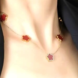 Red Tory Burch style necklace